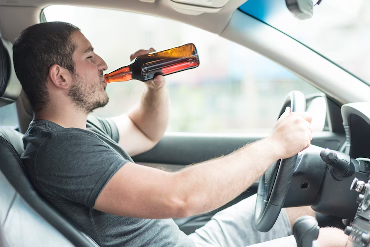  A person drinking while driving