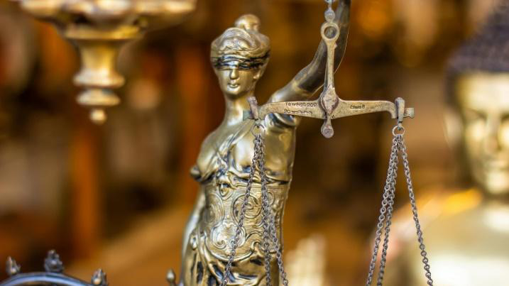 An image of a lady justice statue   