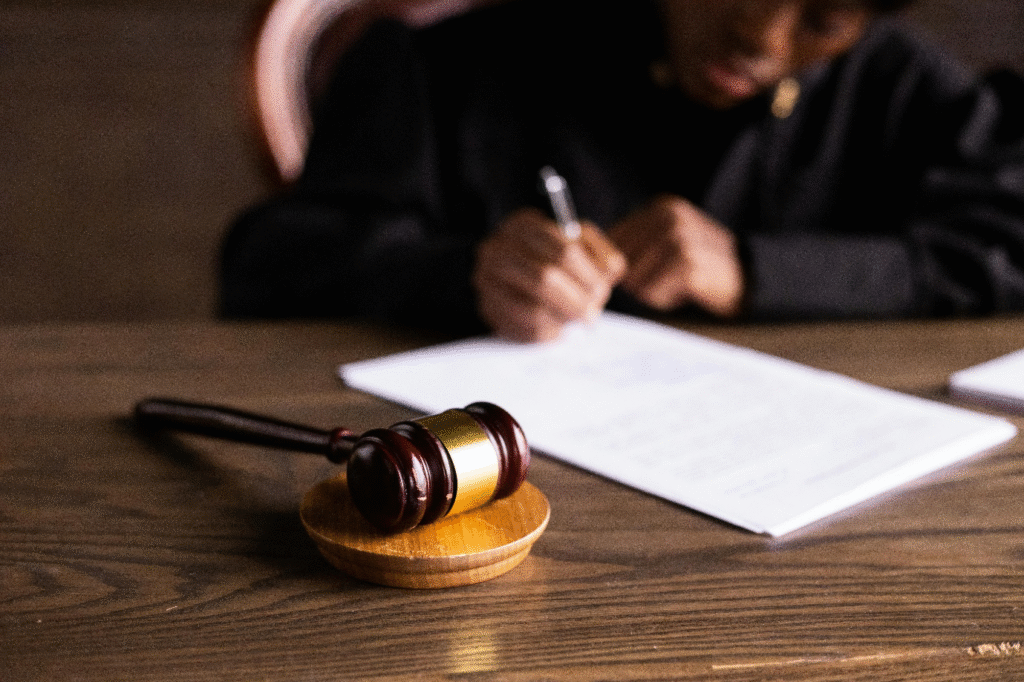 A photo showing a wooden gavel on a table